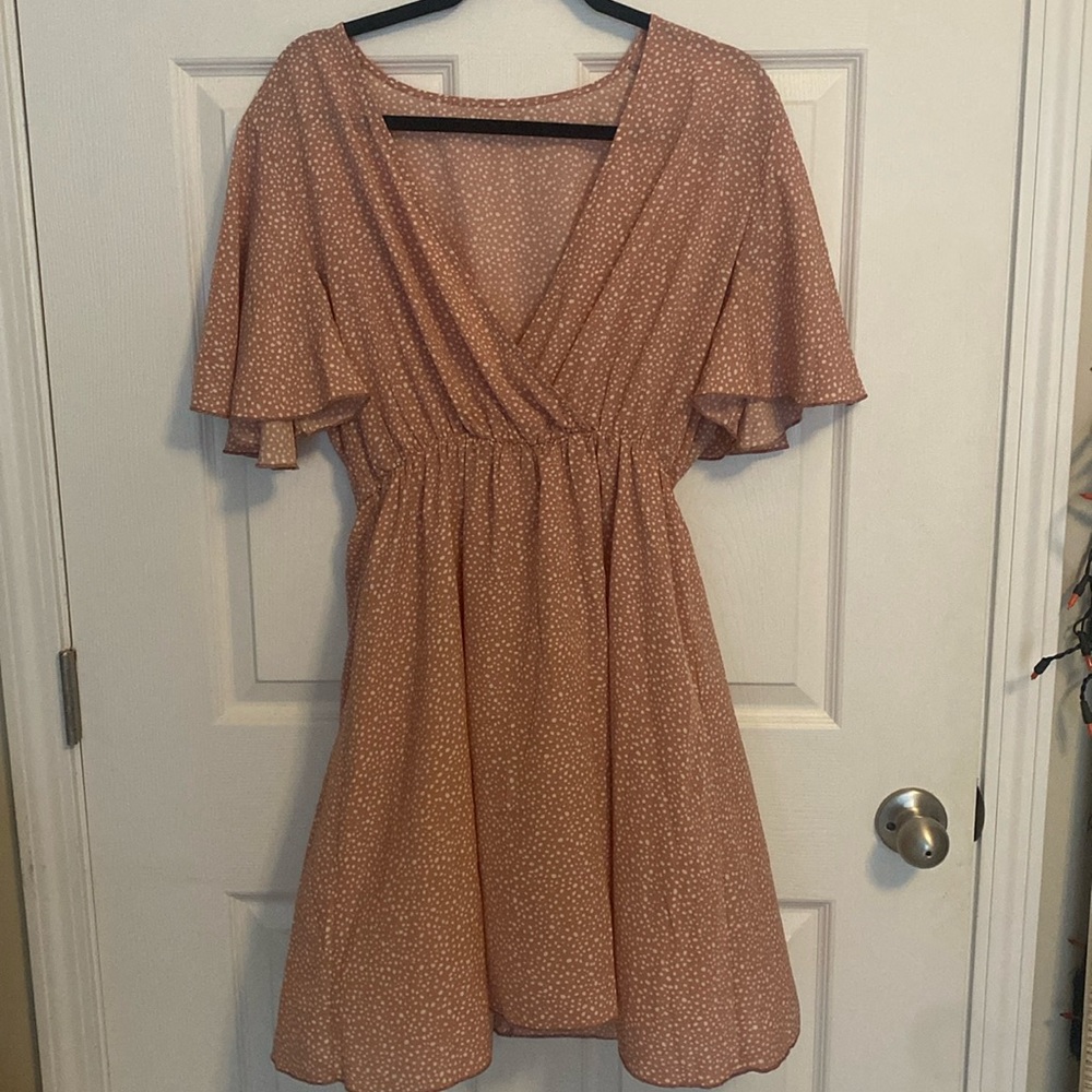 Pink polka dot dress.